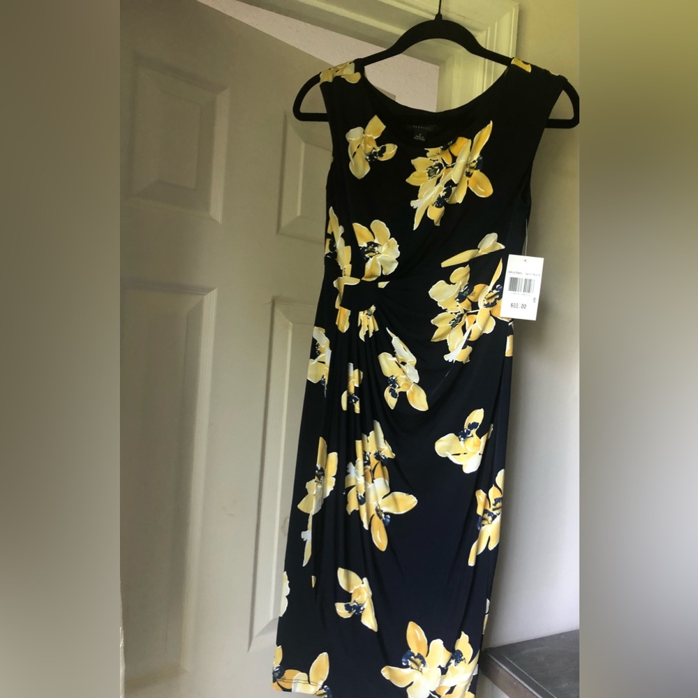 Navy dress with yellow flowers. Size 6, knee length